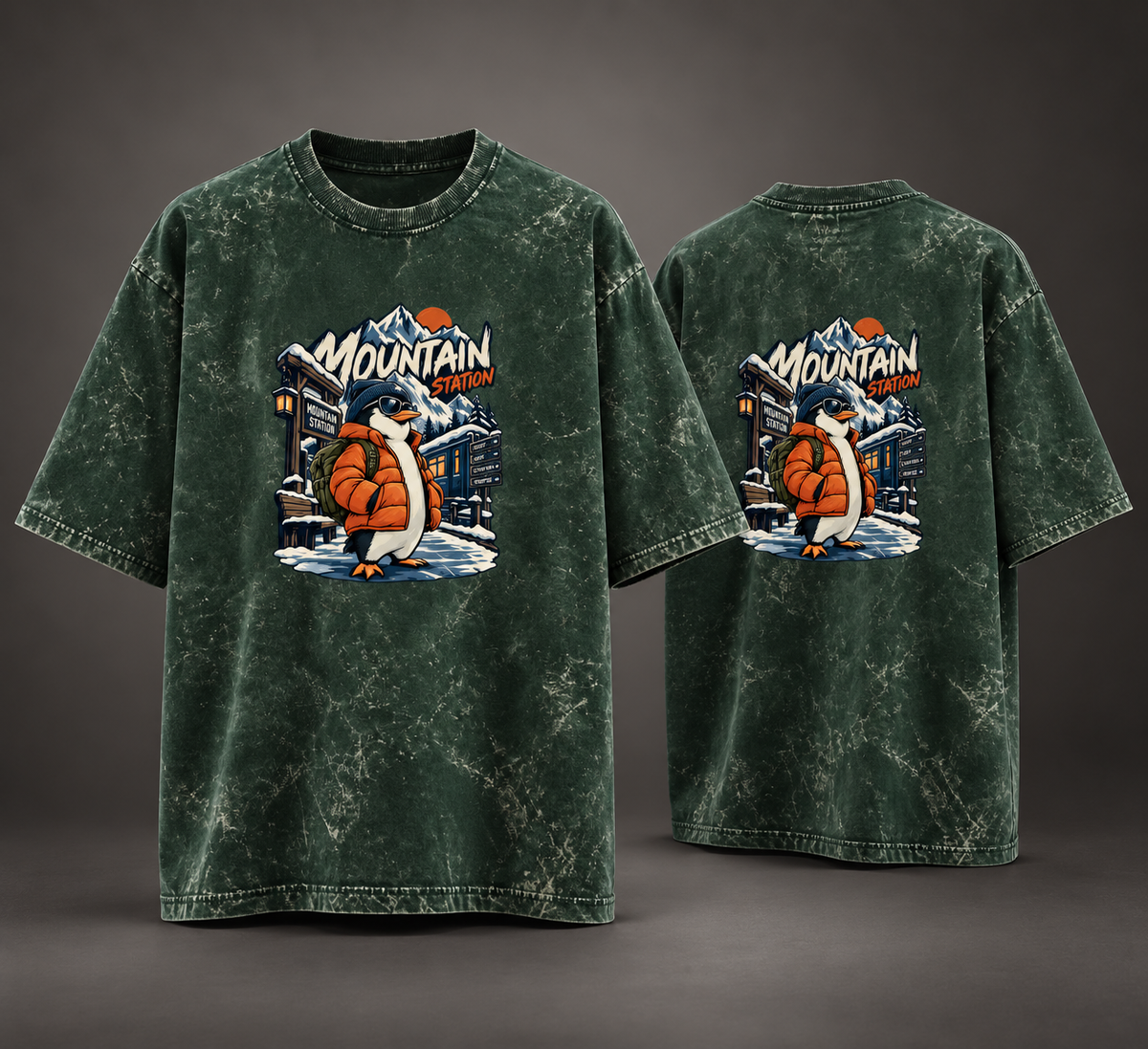 Navy Blue Mountain Station Penguin acid-wash oversized T-shirt, front and back studio product view