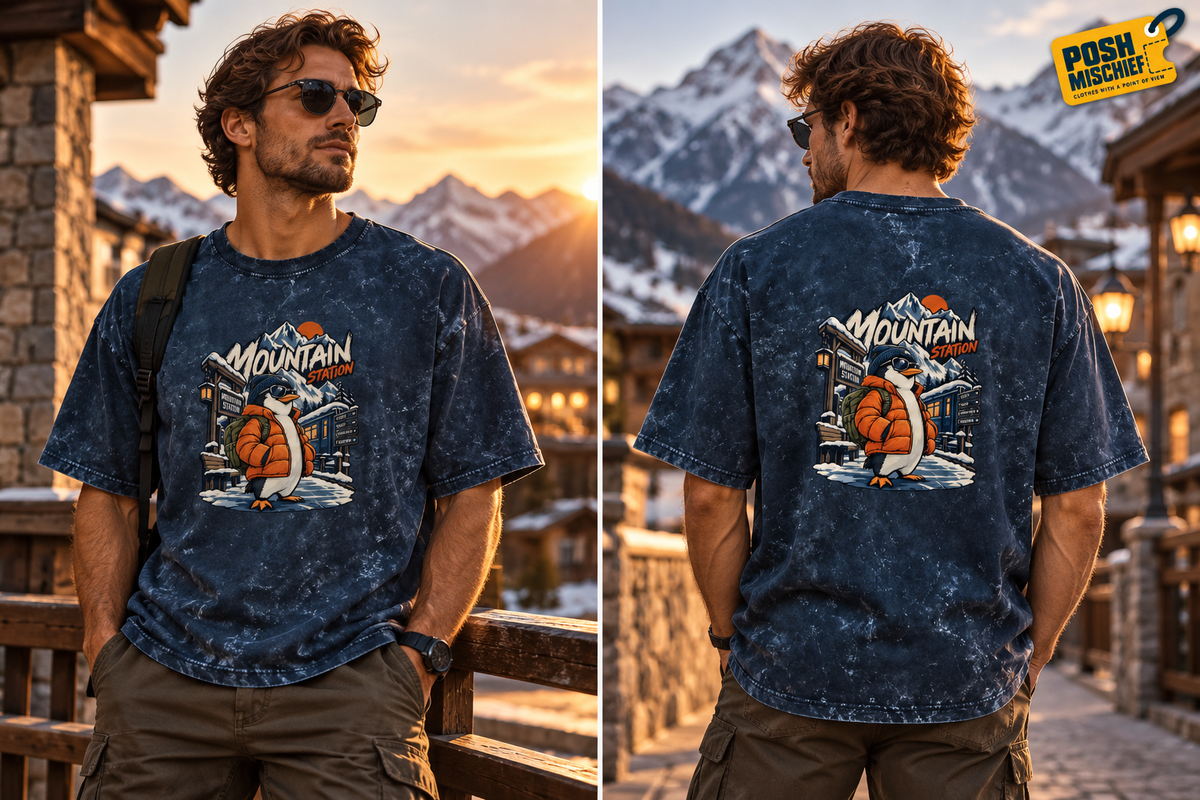 Adult model wearing the Navy Blue Mountain Station Penguin acid-wash oversized T-shirt, front and back outdoor fashion view